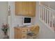 Cozy home office featuring a built-in desk and overhead cabinets at 4012 Owlshead Mountain St, Las Vegas, NV 89129