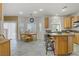 Bright kitchen and dining area featuring tile floors and natural light at 4012 Owlshead Mountain St, Las Vegas, NV 89129