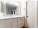 Updated bathroom vanity with new mirror and modern fixtures at 4687 Monterey Cir # 1, Las Vegas, NV 89169