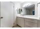 Updated bathroom vanity with new mirror and modern fixtures at 4687 Monterey Cir # 1, Las Vegas, NV 89169