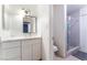 Well-lit bathroom featuring a stylish vanity and shower at 4687 Monterey Cir # 1, Las Vegas, NV 89169
