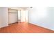 Bright bedroom with closet and wood floors at 4687 Monterey Cir # 1, Las Vegas, NV 89169