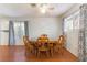 Bright dining room with wooden table and chairs at 4687 Monterey Cir # 1, Las Vegas, NV 89169