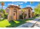 Charming exterior view showcasing the property's unique architecture and well-maintained landscaping at 4687 Monterey Cir # 1, Las Vegas, NV 89169
