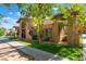 Exterior view showcasing the property's unique architectural design and mature landscaping at 4687 Monterey Cir # 1, Las Vegas, NV 89169