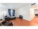 Cozy living area featuring wood floors and ample space at 4687 Monterey Cir # 1, Las Vegas, NV 89169