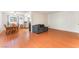 Spacious living area with dining space and wood flooring at 4687 Monterey Cir # 1, Las Vegas, NV 89169