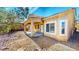 Backyard with a covered patio and gravel landscaping at 524 Blanche Ct, Henderson, NV 89052