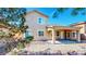 Backyard view of the house with a covered patio at 524 Blanche Ct, Henderson, NV 89052