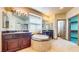 Lavish bathroom boasting dual vanities and a luxurious soaking tub at 524 Blanche Ct, Henderson, NV 89052