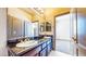 Bathroom featuring double sinks, granite countertops, and modern fixtures at 524 Blanche Ct, Henderson, NV 89052