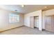 Neutral bedroom with plush carpeting, closet, and an abundance of natural light at 524 Blanche Ct, Henderson, NV 89052