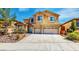 Charming two-story home with attached two car garage and landscaped front yard at 524 Blanche Ct, Henderson, NV 89052