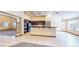 Bright kitchen with stainless steel appliances and granite countertop peninsula at 524 Blanche Ct, Henderson, NV 89052