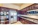 Gourmet kitchen boasts stainless steel appliances, granite counters, and ample cabinet space at 524 Blanche Ct, Henderson, NV 89052