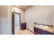 Functional laundry room featuring dark wood cabinets and sink at 524 Blanche Ct, Henderson, NV 89052