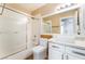 Contemporary bathroom featuring shower-tub combo, toilet, sink, and stylish fixtures at 601 Bear Grass St, Las Vegas, NV 89144