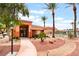 Community clubhouse with desert landscaping, sidewalk and swimming pool at 601 Bear Grass St, Las Vegas, NV 89144