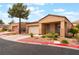 Charming single-story home featuring a two-car garage and desert landscaping at 601 Bear Grass St, Las Vegas, NV 89144