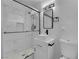 Bright bathroom featuring a marble shower, modern vanity, and stylish fixtures at 608 W Mcdermit St, Las Vegas, NV 89107
