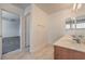 Bathroom with tiled floors and view into the bedroom at 632 Twilight Blue Ave, North Las Vegas, NV 89032