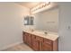 Double sink bathroom vanity with a large mirror and ample storage space at 632 Twilight Blue Ave, North Las Vegas, NV 89032