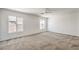 Large, well-lit bedroom with neutral carpet and multiple windows at 632 Twilight Blue Ave, North Las Vegas, NV 89032