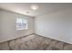 Well-lit bedroom with neutral walls and plush carpeting at 632 Twilight Blue Ave, North Las Vegas, NV 89032