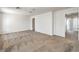 Neutral bedroom featuring neutral carpet and multiple doorways at 632 Twilight Blue Ave, North Las Vegas, NV 89032