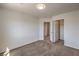 Carpeted bedroom with a closet and attached bathroom at 632 Twilight Blue Ave, North Las Vegas, NV 89032