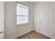 The entry nook shows a window with blinds, new floors, and a white door at 632 Twilight Blue Ave, North Las Vegas, NV 89032