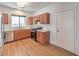 Well-lit kitchen with stainless steel appliances, updated cabinets, and marble countertops at 632 Twilight Blue Ave, North Las Vegas, NV 89032