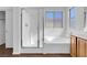 Bathroom features walk-in shower and soaking tub at 648 Sumatra Pl, Henderson, NV 89011