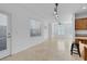 Bright open kitchen with island and tile flooring at 648 Sumatra Pl, Henderson, NV 89011