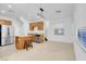Open kitchen with stainless steel appliances and a center island at 648 Sumatra Pl, Henderson, NV 89011