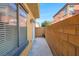 A side yard is an open space on a property's side, enhancing outdoor aesthetics and possibly offering functional use at 648 Sumatra Pl, Henderson, NV 89011