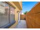 A side yard is an open space on a property's side, enhancing outdoor aesthetics and possibly offering functional use at 648 Sumatra Pl, Henderson, NV 89011