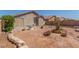 Backyard featuring landscaping and block wall fencing at 6489 Coldwater Bay Dr, Las Vegas, NV 89122