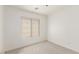 Bedroom with carpet flooring, a window and white walls at 6489 Coldwater Bay Dr, Las Vegas, NV 89122