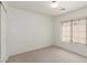 Bedroom featuring carpet, white walls, a window, and a closet at 6489 Coldwater Bay Dr, Las Vegas, NV 89122