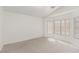 Bright bedroom boasts carpet flooring and natural light at 6489 Coldwater Bay Dr, Las Vegas, NV 89122