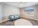 Bright bedroom with neutral paint, carpet floors, and window bench seating at 695 Orbiter Ln, Las Vegas, NV 89148