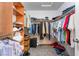 Walk-in closet with built-in shelving and ample storage for clothing and accessories at 695 Orbiter Ln, Las Vegas, NV 89148