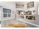 Bright foyer with a coat rack and a view into the dining area at 695 Orbiter Ln, Las Vegas, NV 89148