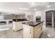 Stylish kitchen featuring granite countertops, modern cabinetry, and stainless steel microwave and oven at 695 Orbiter Ln, Las Vegas, NV 89148