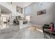 Spacious living room with high ceilings, dining area and elegant décor at 695 Orbiter Ln, Las Vegas, NV 89148