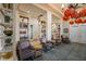 Comfortable lounge area with bookshelves and elegant decor providing a quiet and inviting space at 695 Orbiter Ln, Las Vegas, NV 89148
