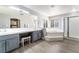Luxurious main bathroom features double sinks, a soaking tub, and a glass shower at 695 Orbiter Ln, Las Vegas, NV 89148