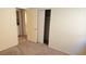 Comfortable bedroom offering plush carpeting, and a spacious closet for ample storage, and a private ensuite at 7053 Magic Moment Ln, Las Vegas, NV 89119