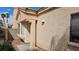 Inviting front entrance showcasing the desert landscaping and the home's architectural details at 7053 Magic Moment Ln, Las Vegas, NV 89119